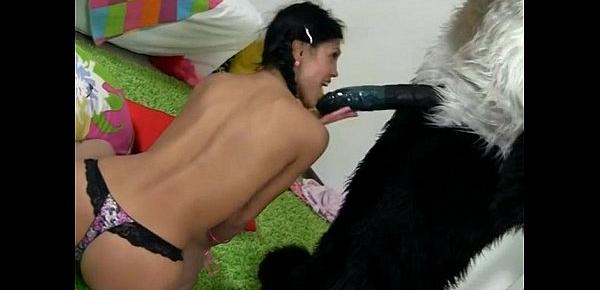  Young girl sucks a huge black dick toy panda